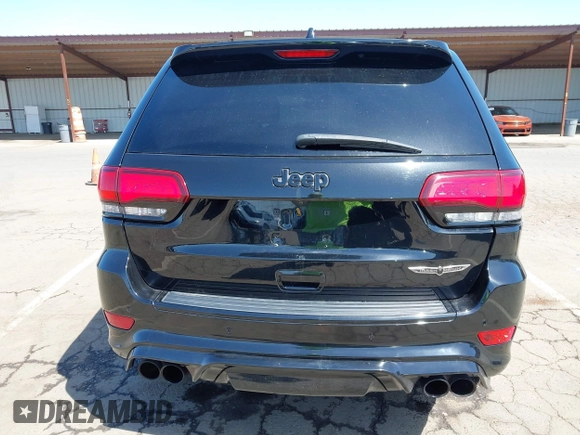 2020 Jeep Grand Cherokee Trackhawk with VIN 1C4RJFN96LC336561, listed as a IAAI auction lot 41991800 with 58,781 mi miles and . Bid and sale history available at DreamBid. Image 16.
