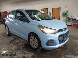 2016 Chevrolet Spark LS with VIN KL8CB6SA9GC574971, listed as a IAAI auction lot 41847239 with 104,169 mi miles. Bid and sale history available at carsss.com. Image 1.