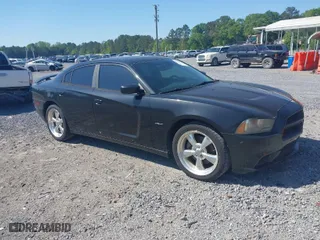 2011 Dodge Charger Road/Track with VIN 2B3CL5CTXBH505387, listed as a IAAI auction lot 42026220 with 205,429 mi miles. Bid and sale history available at carsss.com. Image 1.