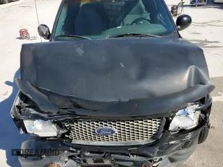 2000 Ford F-150 XL с VIN 1FTZX0726YKB47787, выставлен на аукционе Copart как лот 49712445 с пробегом Не указан миль и Списание • Salvage title. История ставок и продаж доступна на DreamBid. Изображение 11.