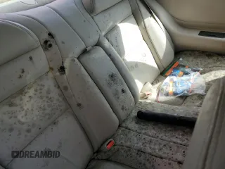 2000 Cadillac Eldorado z VIN 1G6EL12Y7YU198685, wystawiony jako Copart lot #75093094 z przebiegiem Nie podano mil oraz Szkody całkowita. Historia ofert i sprzedaży dostępna na DreamBid. Obrazek 10.