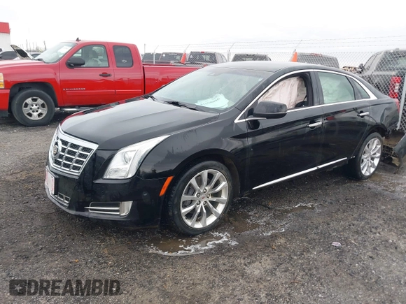 2015 Cadillac XTS Luxury with VIN 2G61M5S38F9138545, listed as a IAAI auction lot 41690696 with 136,460 mi miles and . Bid and sale history available at DreamBid. Image 2.
