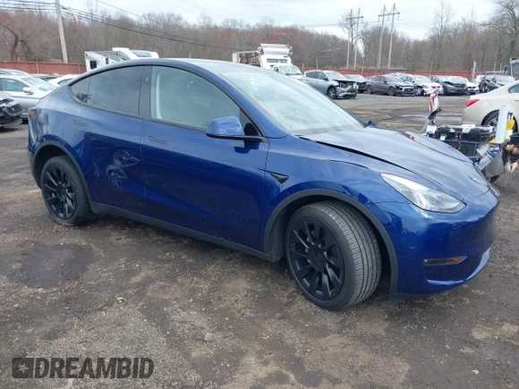 2023 Tesla Model Y Long Range with VIN 7SAYGDEE4PF891709, listed as a IAAI auction lot 41944893 with 15,864 mi miles. Bid and sale history available at carsss.com. Image 1.