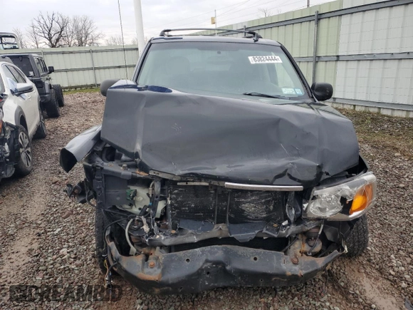 2006 GMC Envoy SLT with VIN 1GKDT13S562265042, listed as a Copart auction lot 83824444 with 0 mi miles and Salvage Title. Bid and sale history available at carsss.com. Image 5.