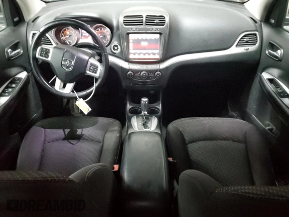 2013 Dodge Journey Crew with VIN 3C4PDCCG4DT693869, listed as a Copart auction lot 63666684 with 134,424 mi miles and Salvage title. Bid and sale history available at DreamBid. Image 8.