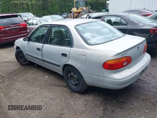 2001 Chevrolet Prizm z VIN 1Y1SK52841Z448303, wystawiony jako IAAI lot #42224410 z przebiegiem 160 577 mil mil oraz . Historia ofert i sprzedaży dostępna na DreamBid. Obrazek 3.