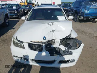 2007 BMW 3 Series 328i with VIN WBAVA33567KX73725, listed as a IAAI auction lot 41985667 with 113,491 mi miles. Bid and sale history available at carsss.com. Image 12.