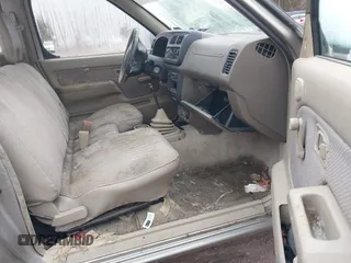 2000 Nissan Frontier XE z VIN 1N6DD21S9YC310558, wystawiony jako IAAI lot #41388581 z przebiegiem Nie podano mil oraz . Historia ofert i sprzedaży dostępna na DreamBid. Obrazek 5.