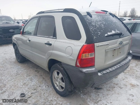 2007 Kia Sportage LX with VIN KNDJF724077301574, listed as a IAAI auction lot 41324962 with 229,597 mi miles. Bid and sale history available at carsss.com. Image 3.