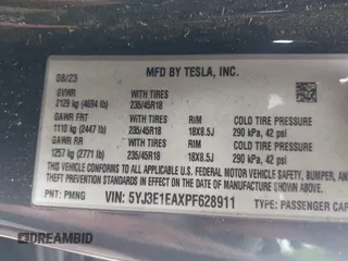 2023 Tesla Model 3 with VIN 5YJ3E1EAXPF628911, listed as a IAAI auction lot 42362410 with 25,387 mi miles and . Bid and sale history available at DreamBid. Image 9.