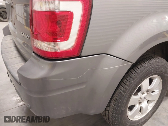 2008 Ford Escape Limited with VIN 1FMCU94178KC99233, listed as a IAAI auction lot 41820482 with 212,498 mi miles. Bid and sale history available at carsss.com. Image 12.