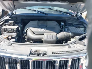 2012 Jeep Grand Cherokee Laredo with VIN 1C4RJEAG4CC167557, listed as a IAAI auction lot 42047720 with 195,631 mi miles. Bid and sale history available at carsss.com. Image 10.