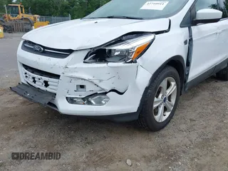 2014 Ford Escape SE with VIN 1FMCU9GX4EUE32062, listed as a IAAI auction lot 42710911 with 68,201 mi miles and . Bid and sale history available at DreamBid. Image 6.