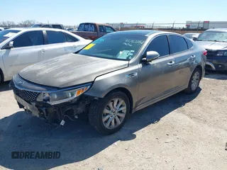 2016 Kia Optima EX with VIN 5XXGU4L31GG106854, listed as a IAAI auction lot 41762052 with 122,121 mi miles. Bid and sale history available at carsss.com. Image 17.