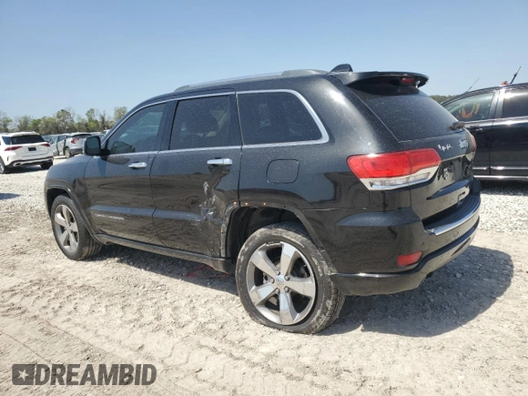 2015 Jeep Grand Cherokee High Altitude with VIN 1C4RJECGXFC906464, listed as a Copart auction lot 49657955 with 125,239 mi miles and Salvage Title. Bid and sale history available at carsss.com. Image 2.