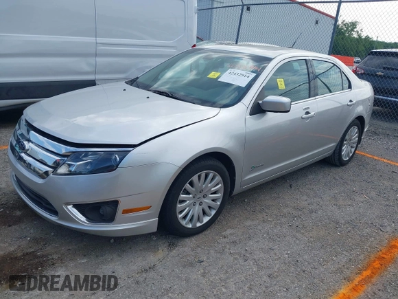 2011 Ford Fusion Hybrid z VIN 3FADP0L34BR208880, wystawiony jako IAAI lot #42432914 z przebiegiem 75 621 mil mil oraz . Historia ofert i sprzedaży dostępna na DreamBid. Obrazek 2.