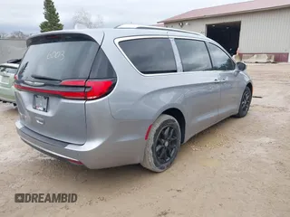 2021 Chrysler Pacifica Touring L z VIN 2C4RC1BG0MR531936, wystawiony jako IAAI lot #42176003 z przebiegiem 109 633 mil mil oraz . Historia ofert i sprzedaży dostępna na DreamBid. Obrazek 4.
