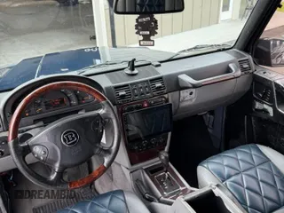 2003 Mercedes-Benz G 500 z VIN WDCYR49E73X137599, wystawiony jako Copart lot #56765315 z przebiegiem 157 409 mil mil oraz Tytuł czysty. Historia ofert i sprzedaży dostępna na DreamBid. Obrazek 9.