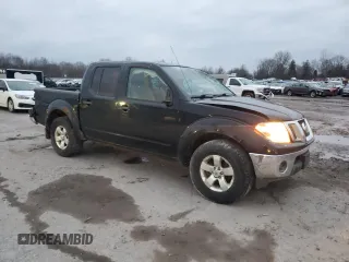 2010 Nissan Frontier SE with VIN 1N6AD0EV9AC444472, listed as a Copart auction lot 84155944 with 221,725 mi miles and Salvage title. Bid and sale history available at DreamBid. Image 4.