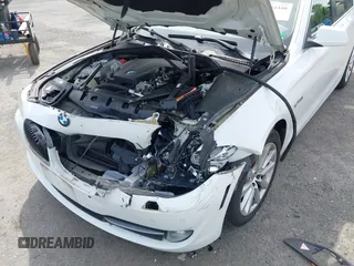 2013 BMW 5 Series 528i xDrive with VIN WBAXH5C54DD107317, listed as a IAAI auction lot 42244446 with 47,858 mi miles and . Bid and sale history available at DreamBid. Image 6.
