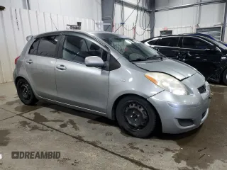 2009 Toyota Yaris with VIN JTDKT903X95231860, listed as a Copart auction lot 51908185 with 135,701 mi miles and Salvage Title. Bid and sale history available at carsss.com. Image 4.