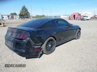 2014 Ford Mustang GT with VIN 1ZVBP8CF5E5201080, listed as a IAAI auction lot 42191392 with 42,701 mi miles and . Bid and sale history available at DreamBid. Image 4.