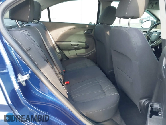 2013 Chevrolet Sonic LT with VIN 1G1JC5SB2D4147595, listed as a IAAI auction lot 41643641 with 83,538 mi miles and . Bid and sale history available at DreamBid. Image 8.