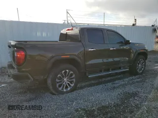 2023 GMC Canyon 4WD Denali with VIN 1GTP6FEK2P1219170, listed as a Copart auction lot 80591493 with 3,985 mi miles. Bid and sale history available at carsss.com. Image 3.