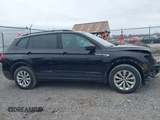 2019 Volkswagen Tiguan S with VIN 3VV0B7AX9KM019775, listed as a IAAI auction lot 41897497 with 61,691 mi miles and . Bid and sale history available at DreamBid. Image 14.