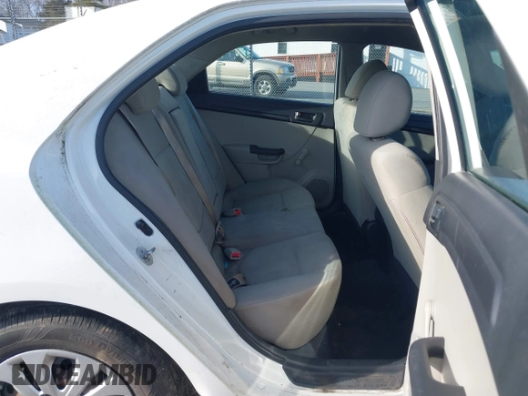 2011 Kia Forte LX with VIN KNAFT4A27B5434458, listed as a IAAI auction lot 41269635 with 238,721 mi miles. Bid and sale history available at carsss.com. Image 8.