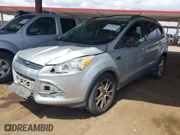2013 Ford Escape SE with VIN 1FMCU0GX9DUB83512, listed as a IAAI auction lot 41970256 with 69,897 mi miles and . Bid and sale history available at DreamBid. Image 17.
