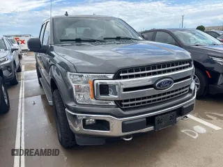 2018 Ford F-150 XL with VIN 1FTEW1EG5JFC77113, listed as a IAAI auction lot 42154366 with 185,929 mi miles. Bid and sale history available at carsss.com. Image 1.