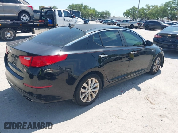 2014 Kia Optima EX with VIN 5XXGN4A72EG294381, listed as a IAAI auction lot 41944473 with 119,781 mi miles and . Bid and sale history available at carsss.com. Image 4.
