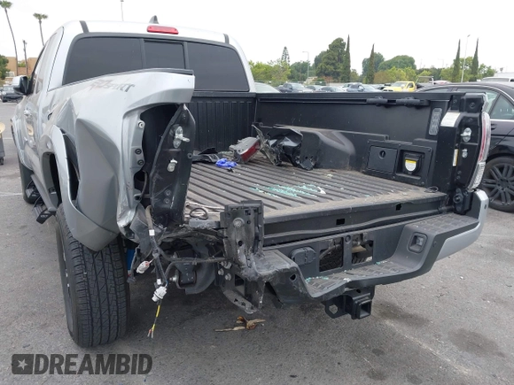 2022 Toyota Tacoma SR with VIN 3TYRZ5CN9NT022492, listed as a IAAI auction lot 42378801 with 9,312 mi miles and . Bid and sale history available at DreamBid. Image 6.