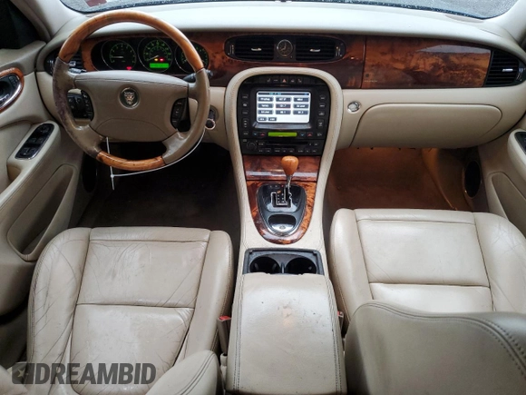 2004 Jaguar XJ with VIN SAJWA71C24SG33915, listed as a Copart auction lot 69626864 with 123,746 mi miles and Non Repairable. Bid and sale history available at carsss.com. Image 8.
