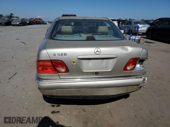 1997 Mercedes-Benz E-Class with VIN WDBJF55F8VJ031008, listed as a Copart auction lot 74305684 with 308,905 mi miles and Clean Title. Bid and sale history available at carsss.com. Image 6.