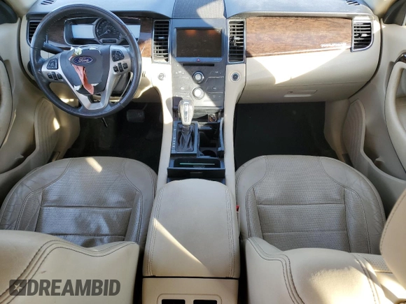 2014 Ford Taurus Limited with VIN 1FAHP2F81EG183128, listed as a Copart auction lot 82409384 with 107,624 mi miles and Salvage title. Bid and sale history available at DreamBid. Image 8.