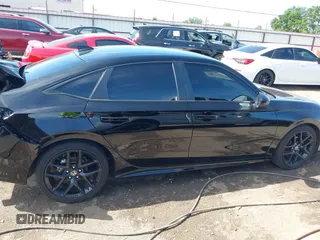 2023 Honda Civic Sport with VIN 2HGFE2F58PH557787, listed as a IAAI auction lot 42207827 with 51,885 mi miles and . Bid and sale history available at DreamBid. Image 13.