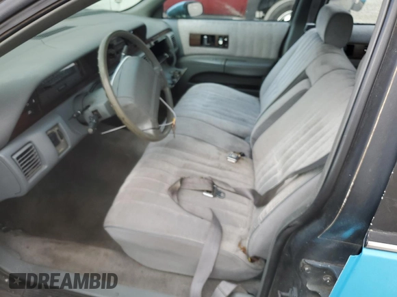1991 Chevrolet Caprice z VIN 1G1BL83EXMW257393, wystawiony jako Copart lot #85267614 z przebiegiem 195 128 mil mil oraz Nie do naprawy • Non repairable. Historia ofert i sprzedaży dostępna na DreamBid. Obrazek 7.