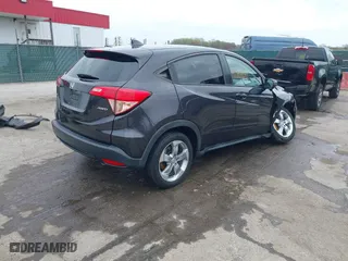 2016 Honda HR-V EX with VIN 3CZRU6H50GM767606, listed as a IAAI auction lot 41942651 with 143,332 mi miles. Bid and sale history available at carsss.com. Image 4.