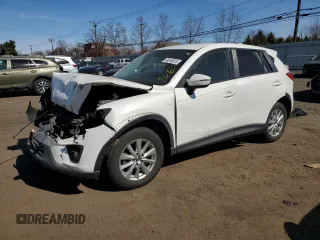 2015 Mazda CX-5 Touring with VIN JM3KE4CY6F0470164, listed as a Copart auction lot 48616815 with 0 mi miles and Salvage Title. Bid and sale history available at carsss.com. Image 1.