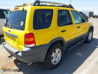2003 Ford Escape XLT Popular 2 with VIN 1FMCU93143KC88233, listed as a IAAI auction lot 41929404 with 225,946 mi miles. Bid and sale history available at carsss.com. Image 4.