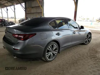 2018 Infiniti Q50 Luxe z VIN JN1EV7AR0JM444036, wystawiony jako Copart lot #49555055 z przebiegiem 76 319 mil mil oraz Czysty tytuł • Clean title. Historia ofert i sprzedaży dostępna na DreamBid. Obrazek 3.