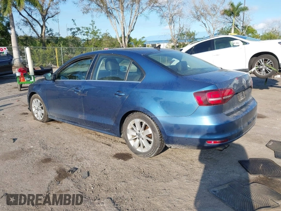 2016 Volkswagen Jetta Sedan 1.4T SE with VIN 3VWD67AJ0GM328412, listed as a IAAI auction lot 41556254 with 137,814 mi miles. Bid and sale history available at carsss.com. Image 3.