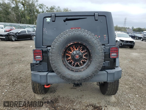 2018 Jeep Wrangler JK Unlimited Sport S with VIN 1C4BJWDG0JL818800, listed as a Copart auction lot 88286715 with 114,011 mi miles and Salvage Title. Bid and sale history available at carsss.com. Image 6.