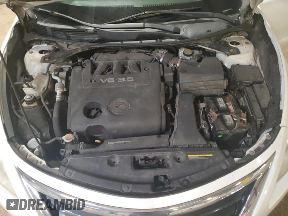 2013 Nissan Altima SL z VIN 1N4BL3APXDN432686, wystawiony jako Copart lot #65256995 z przebiegiem 122 724 mil mil oraz Szkoda całkowita • Salvage title. Historia ofert i sprzedaży dostępna na DreamBid. Obrazek 11.