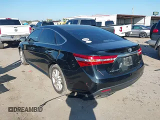 2013 Toyota Avalon XLE with VIN 4T1BK1EB2DU044496, listed as a IAAI auction lot 41573509 with 214,879 mi miles and . Bid and sale history available at DreamBid. Image 3.