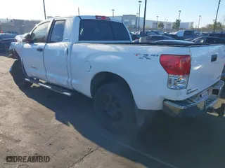 2013 Toyota Tundra 4WD Truck with VIN 5TFUW5F1XDX305466, listed as a IAAI auction lot 41862141 with 133,433 mi miles. Bid and sale history available at carsss.com. Image 3.