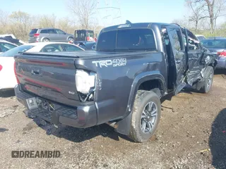 2017 Toyota Tacoma SR5 with VIN 3TMCZ5AN9HM066386, listed as a IAAI auction lot 41991947 with 117,350 mi miles. Bid and sale history available at carsss.com. Image 4.