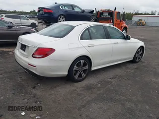 2018 Mercedes-Benz E-Class E 300 with VIN WDDZF4JB2JA350535, listed as a IAAI auction lot 41615741 with 148,004 mi miles. Bid and sale history available at carsss.com. Image 4.